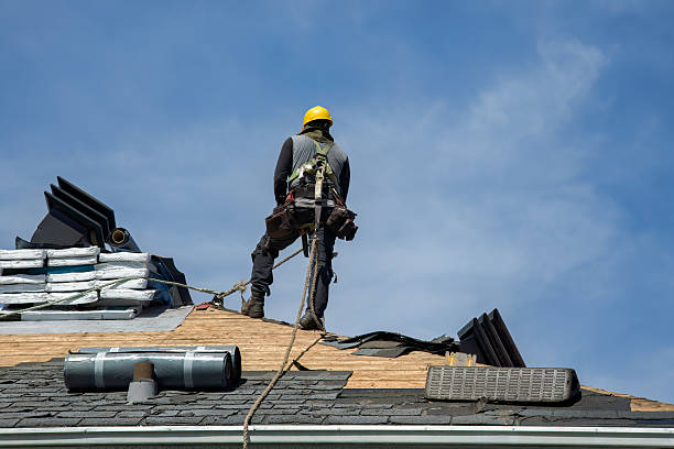 Professional Metal Roofing technician working in Bellaire, MI